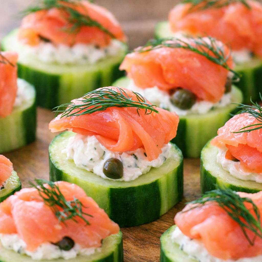 Smoked salmon and cream cheese cucumber bites garnished with dill