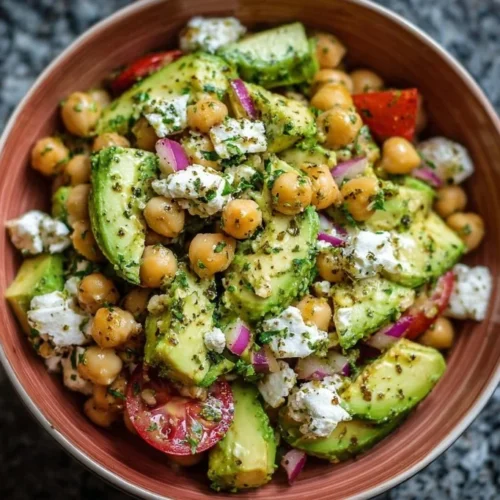 Chickpea Feta Avocado Salad with fresh ingredients in a bowl