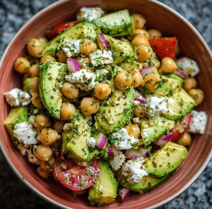 Chickpea Feta Avocado Salad with fresh ingredients in a bowl