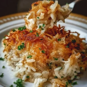 French onion chicken rice bake featuring tender chicken and melted cheese
