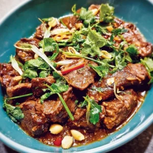 Beef with Lemongrass and Cilantro Beef with lemongrass and cilantro garnished for a flavorful dish