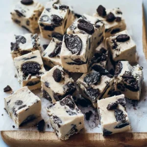 Cookies and Cream Fudge Delicious homemade Cookies and Cream Fudge with chocolate chips and crushed cookies