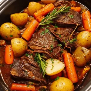 Crock Pot Pot Roast Delicious crock pot pot roast served with vegetables