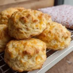 Fluffy cheddar biscuits baked to perfection, golden and delicious.