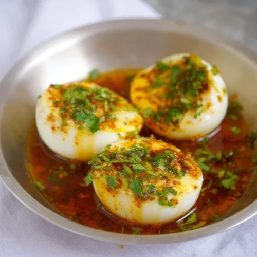 TikTok Egg Boil recipe with colorful seasonings and boiled eggs