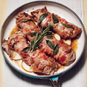 Veal Jumping in the Mouth Tender veal dish ready to delight your taste buds with rich, savory flavors.