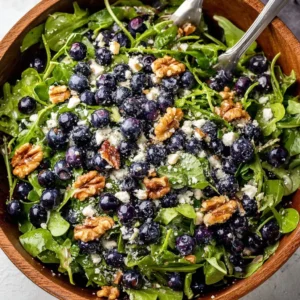 Blueberry Walnut Salad with honey lemon vinaigrette in a bowl