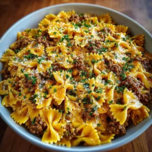 Cajun Cream Cheese Alfredo Bowties with Spiced Ground Beef dish on a plate