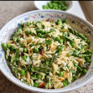 Easy spring orzo pasta salad with fresh vegetables and dressing