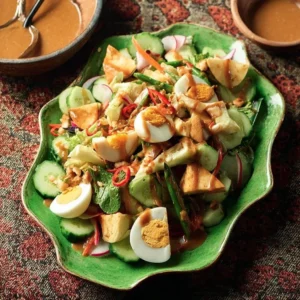 Plate of Gado Gado Salad with fresh veggies and peanut sauce