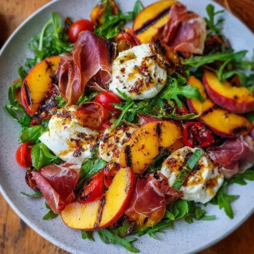 Grilled Nectarine Salad with Burrata and Prosciutto, showcasing vibrant colors and textures.