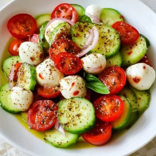 Juicy Cucumber Caprese Salad with tomatoes and mozzarella