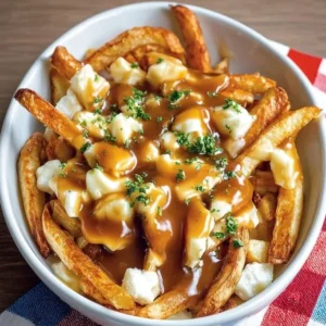 Poutine Recipe: Crispy Fries with Rich Gravy and Melting Cheese Delicious poutine with crispy fries, rich gravy, and melting cheese curds