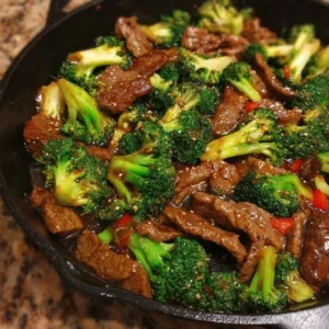 Beef and Broccoli Stir Fry Delicious Beef and Broccoli Stir Fry served in a bowl