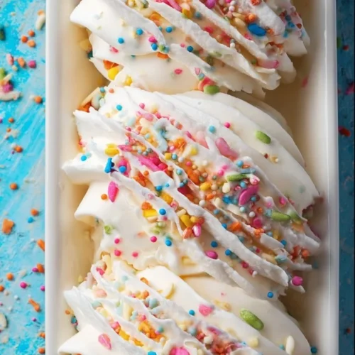 Birthday Cake Ice Cream Delicious birthday cake ice cream in a colorful bowl with sprinkles.