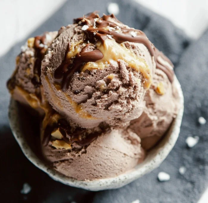 A delicious bowl of Chocolate Peanut Butter Ripple Ice Cream with swirls of chocolate and peanut butter.