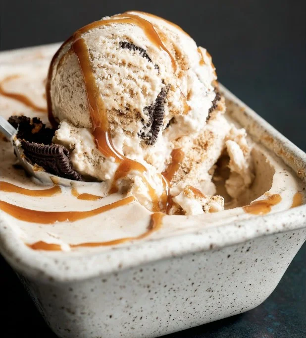 Delicious Coffee Caramel Cookie Ice Cream topped with caramel drizzle and cookie pieces