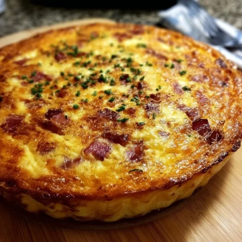 Crustless bacon cheese quiche served on a plate, perfect for busy mornings