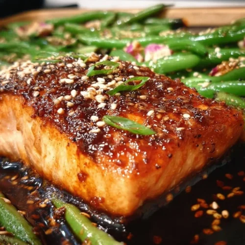 Crispy sheet pan teriyaki salmon served with sesame green beans