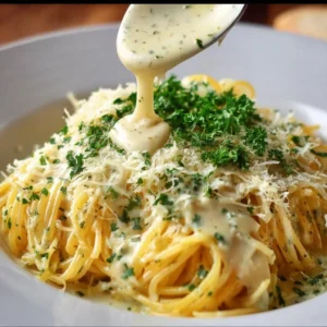 My Take: Garlic Cream Sauce Recipe Homemade garlic cream sauce served over pasta