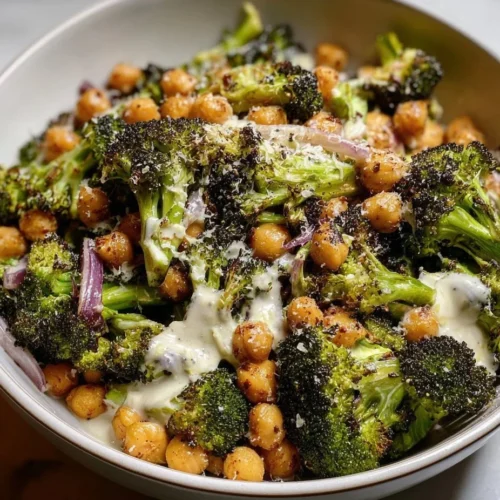 Roasted broccoli chickpea salad with tahini-Parmesan dressing in a bowl