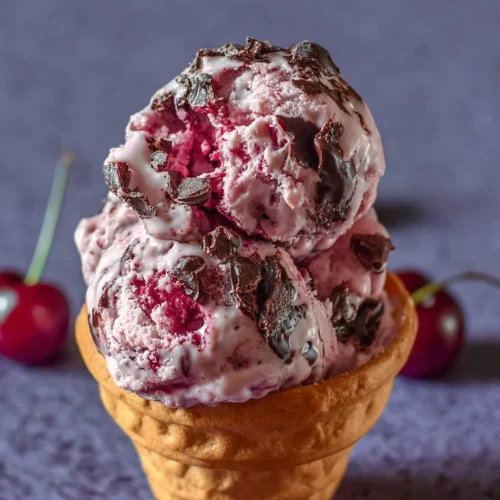 Roasted cherry ice cream topped with dark chocolate crackle dessert