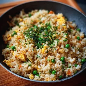 Delicious bowl of Japanese garlic fried rice ready for a cozy night in
