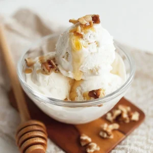 Delicious Sea Salt Honey Nut Ice Cream in a bowl with a spoon