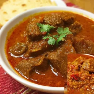 Delicious Slow Cooker Beef Madras Curry served in a bowl with rice
