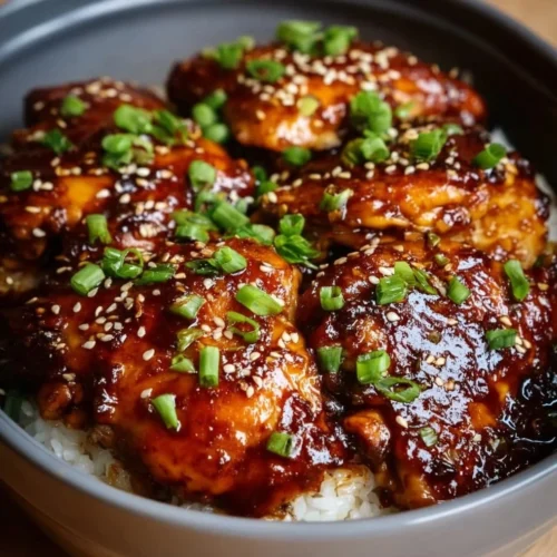 Slow Cooker Honey Garlic Chicken served with rice and vegetables