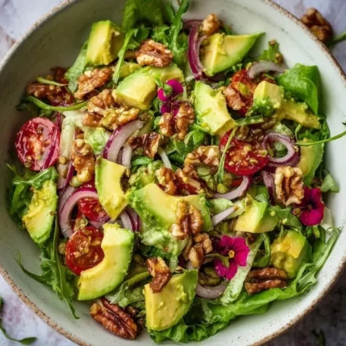 Vibrant spring salad featuring avocado and fresh vegetables