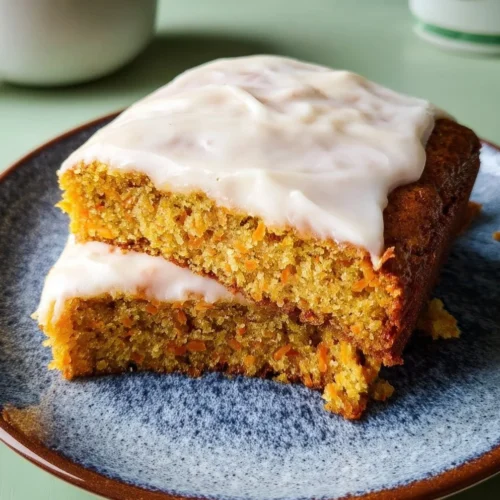 Cornmeal Carrot Cake Delicious slice of cornmeal carrot cake topped with cream cheese frosting