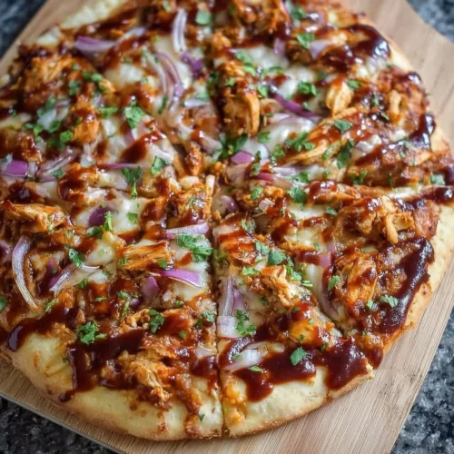 Delicious homemade BBQ chicken pizza topped with barbecue sauce and chicken pieces