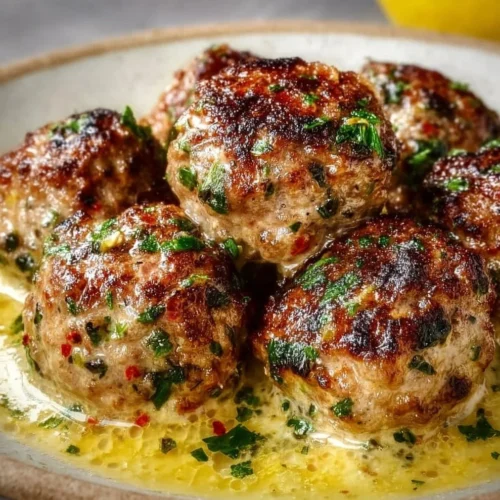 Delicious Greek meatballs simmered in a tangy lemon sauce