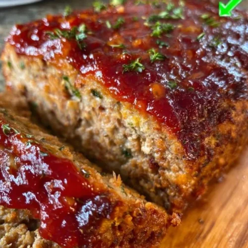 Grandma’s Glazed Meatloaf: A Delicious Family Recipe! Delicious glazed meatloaf served on a plate with vegetables