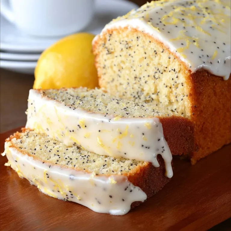Delicious slice of Lemon Poppy Seed Cake garnished with lemon zest