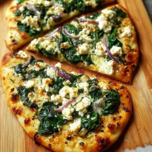 Delicious Spinach Feta Pizza on a rustic wooden table