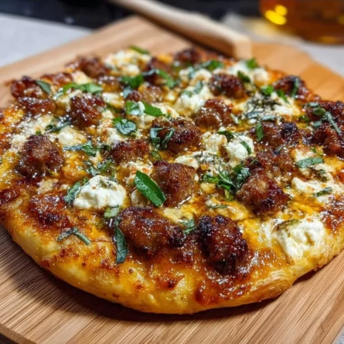 Sweet and spicy sausage ricotta honey pizza topped with fresh ingredients